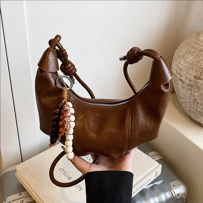 حقيبة دامبلينج - صورة 1